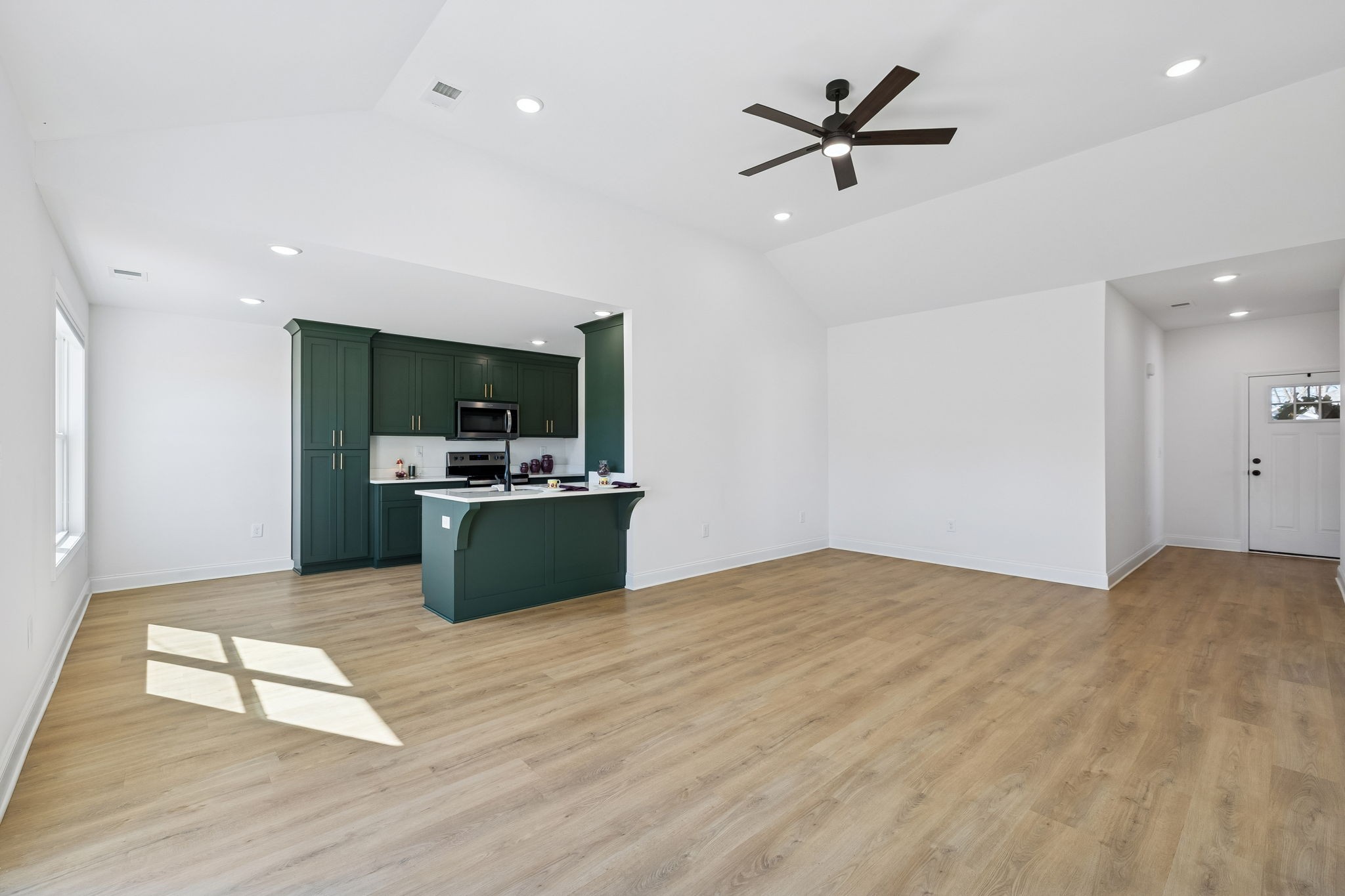1306 Angus Way Greenbrier, TN 37073 - Photo 23 of 36 a view of kitchen with sink microwave and refrigerator