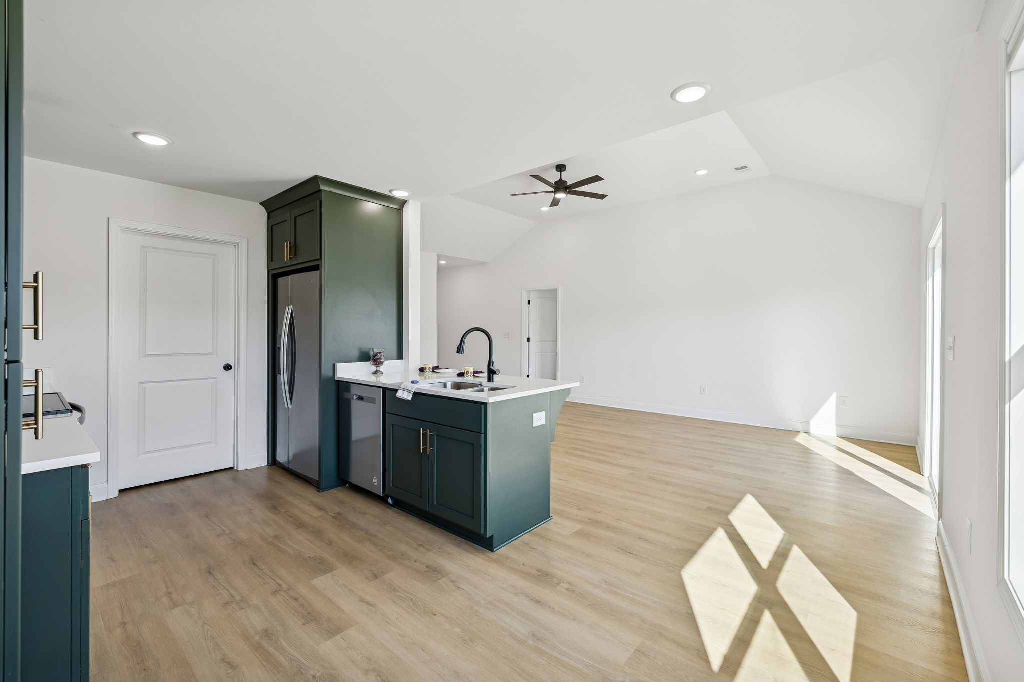 1306 Angus Way Greenbrier, TN 37073 - Photo 27 of 36 a view of kitchen with sink wooden floor and refrigerator