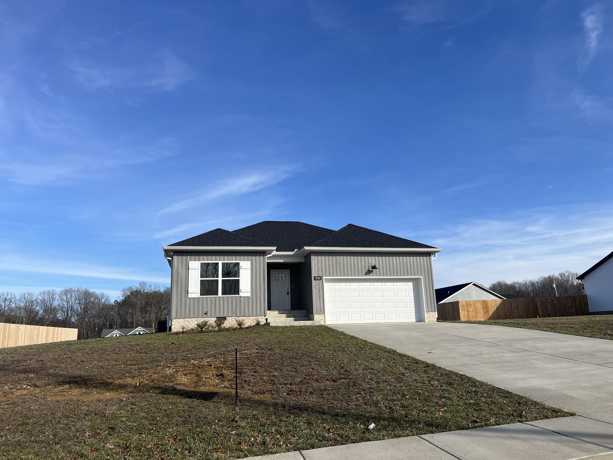 1306 Angus Way Greenbrier, TN 37073 - Photo 3 of 36 a front view of a house with a yard