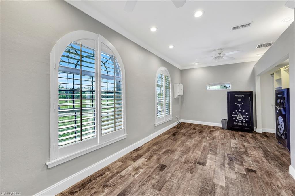 2875 Garland Road Naples, FL 34117 - Photo 16 of 34 a view of an empty room and window