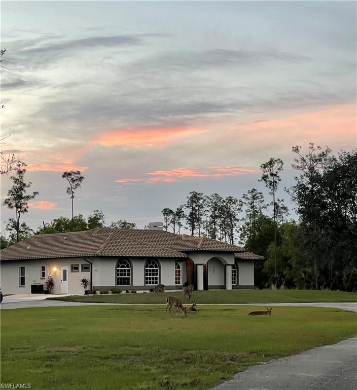 2875 Garland Road Naples, FL 34117 - Photo 34 of 34 a view of building with yard