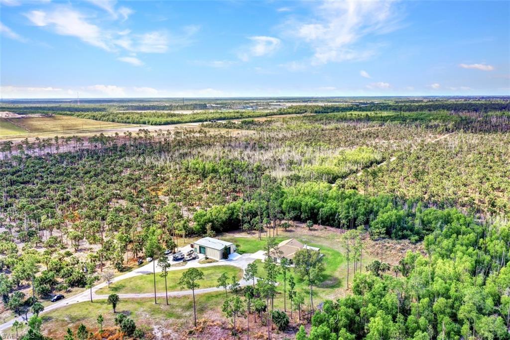 2875 Garland Road Naples, FL 34117 - Photo 4 of 34 a view of an outdoor space and a lake view in the back