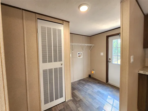 a kitchen with stainless steel appliances granite countertop a refrigerator and a stove