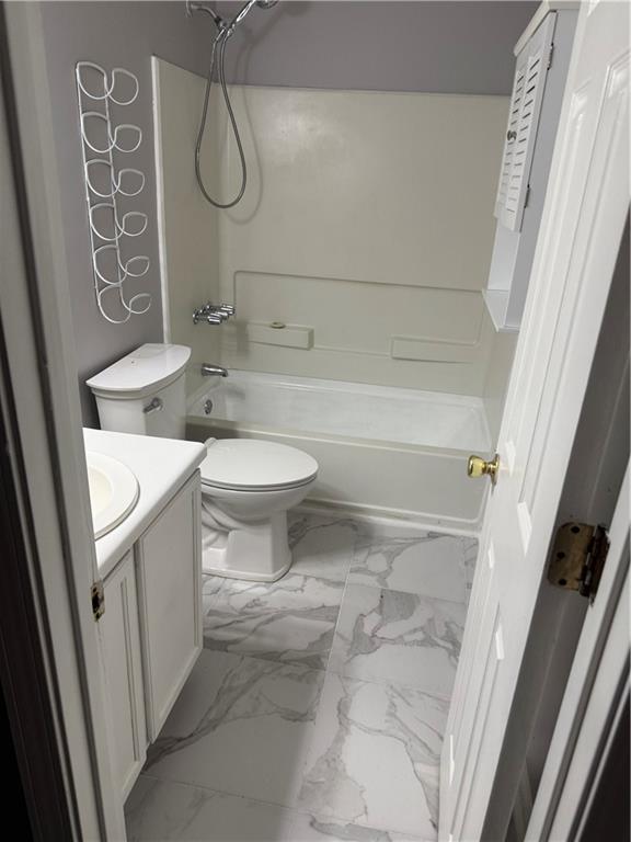 6341 Wedgeview Drive Tucker, GA 30084 - Photo 17 of 26 a bathroom with a toilet and shower