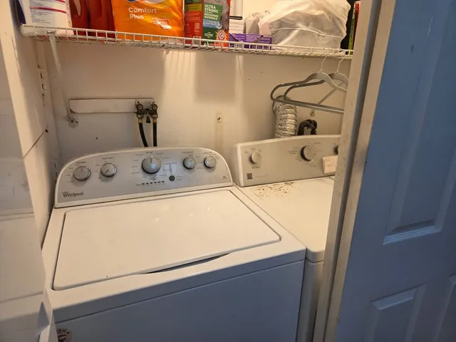a utility room with dryer and washer