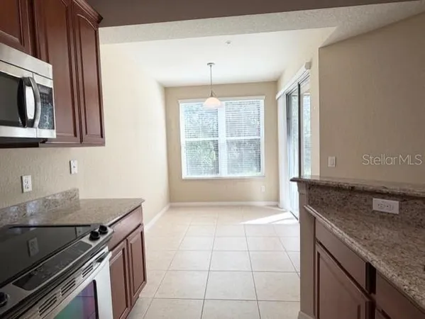 $215,000 | 8350 Bella Tierra Court, Unit 8350, Davenport, FL 33896