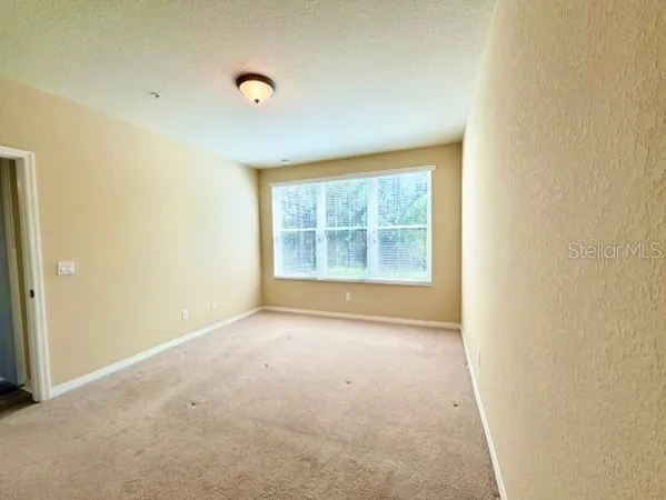 $215,000 | 8350 Bella Tierra Court, Unit 8350, Davenport, FL 33896