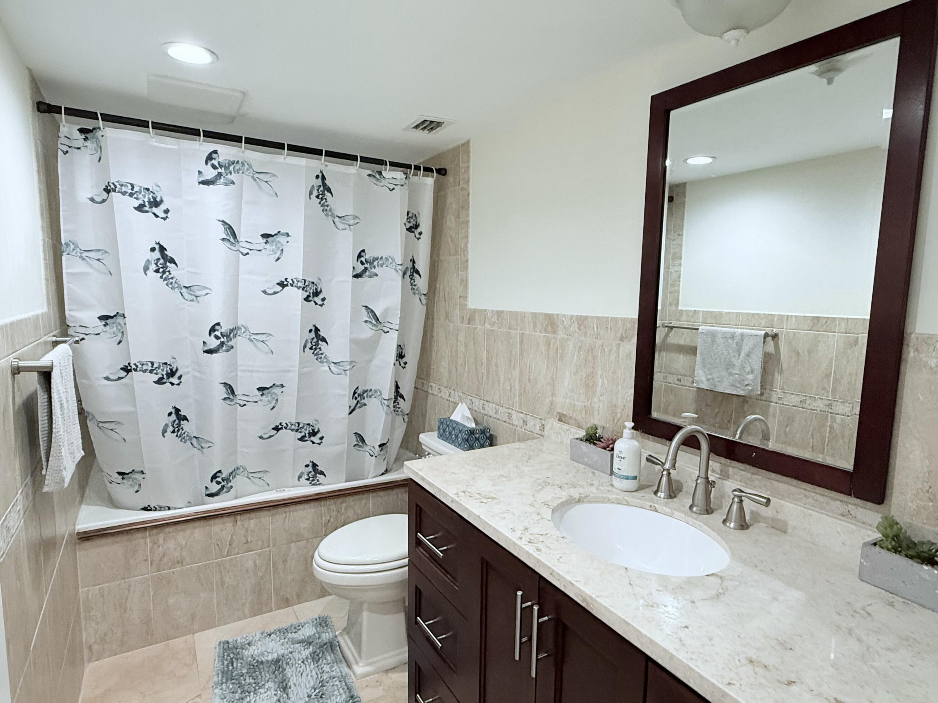 2851 South Ocean Boulevard, Unit 1A Boca Raton, FL 33432 - Photo 23 of 52 Guest Bath