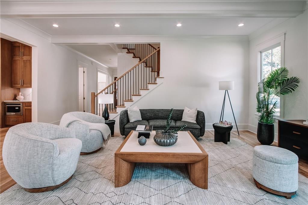 585 Sherwood Road Northeast Atlanta, GA 30324 - Photo 15 of 104 a living room with furniture potted plant and a window