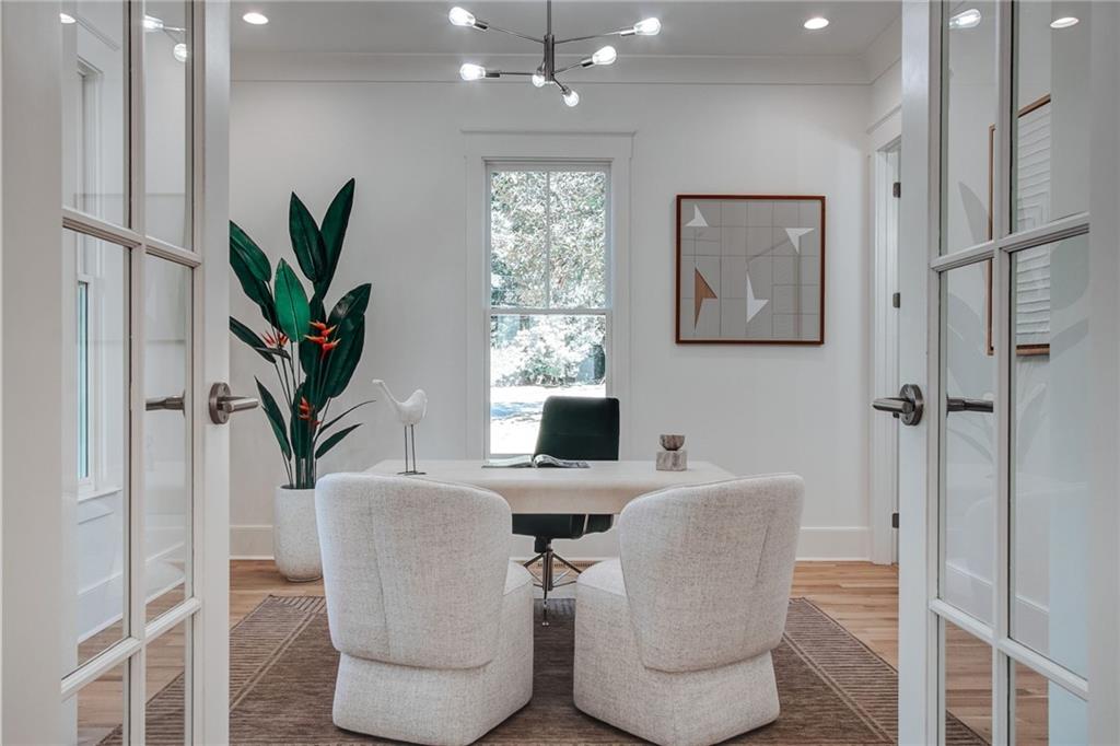 585 Sherwood Road Northeast Atlanta, GA 30324 - Photo 17 of 104 a dining room with furniture and a potted plant