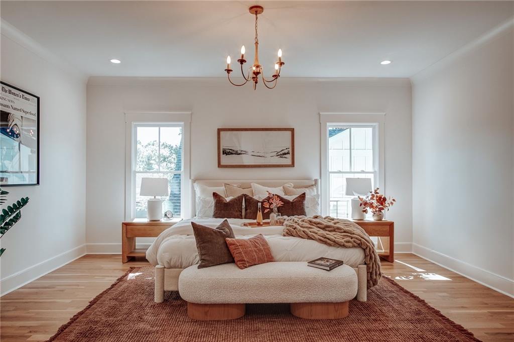 585 Sherwood Road Northeast Atlanta, GA 30324 - Photo 20 of 104 a living room with furniture and a chandelier