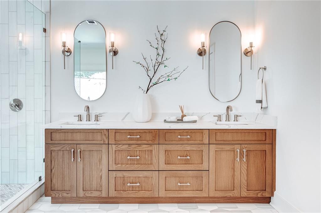 585 Sherwood Road Northeast Atlanta, GA 30324 - Photo 26 of 104 a bathroom with a double vanity sink mirror and