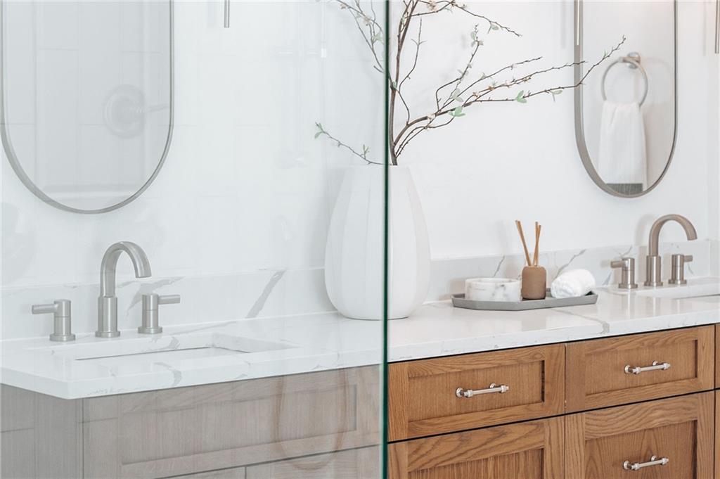 585 Sherwood Road Northeast Atlanta, GA 30324 - Photo 27 of 104 a bathroom with a sink and a mirror