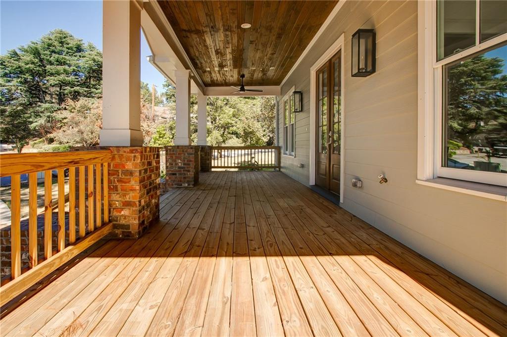 585 Sherwood Road Northeast Atlanta, GA 30324 - Photo 3 of 104 a view of balcony with wooden floor