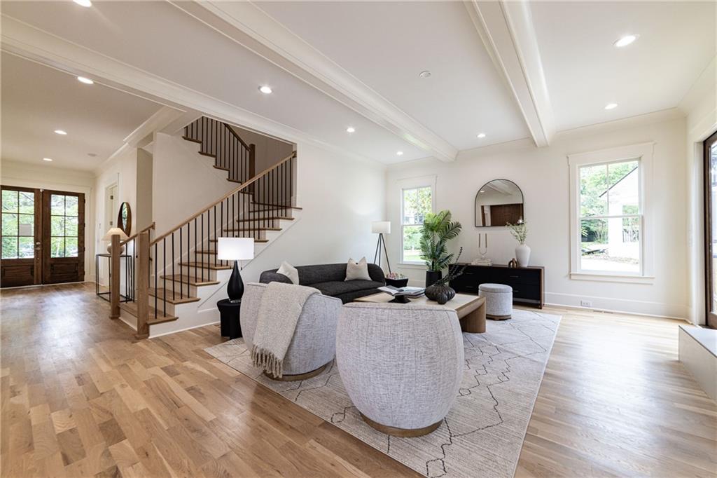 585 Sherwood Road Northeast Atlanta, GA 30324 - Photo 44 of 104 a living room with furniture or wooden floor and a large window