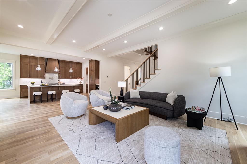 585 Sherwood Road Northeast Atlanta, GA 30324 - Photo 45 of 104 a living room with furniture and a wooden floor