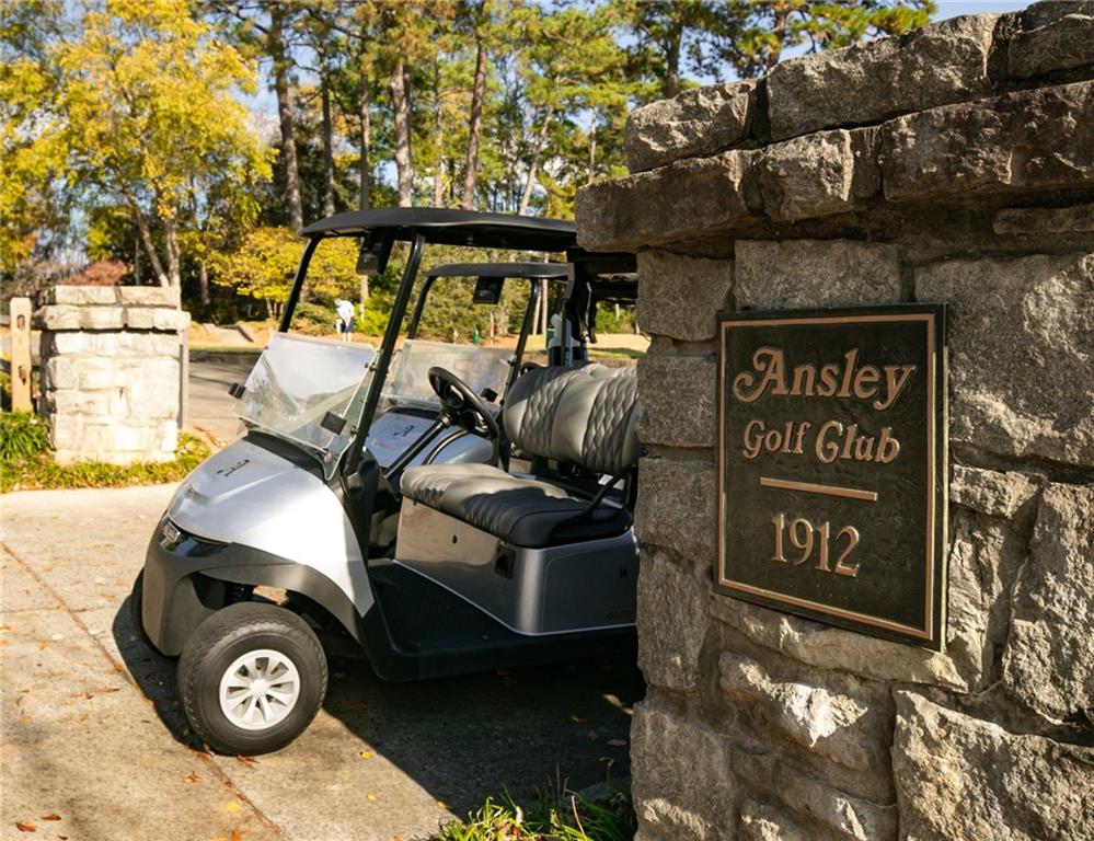 585 Sherwood Road Northeast Atlanta, GA 30324 - Photo 90 of 104 a front view of a house with parking area