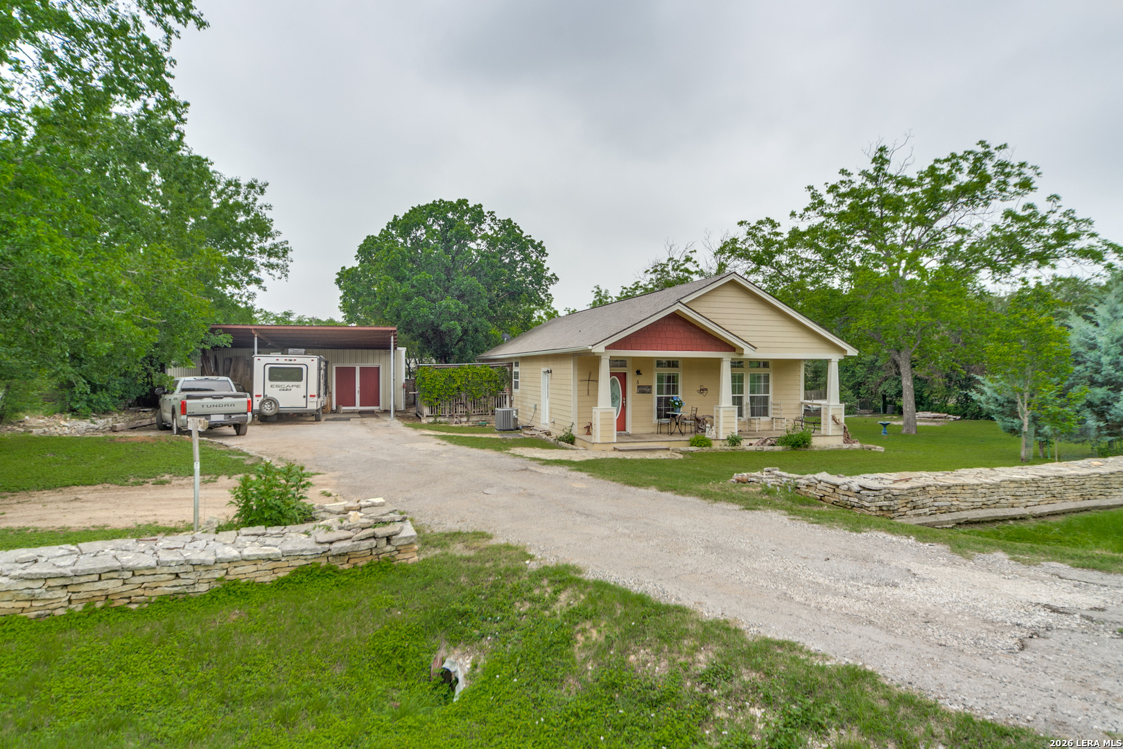 5 Fm 473 Comfort, TX 78013 - Photo 1 of 27 a front view of a house with a yard