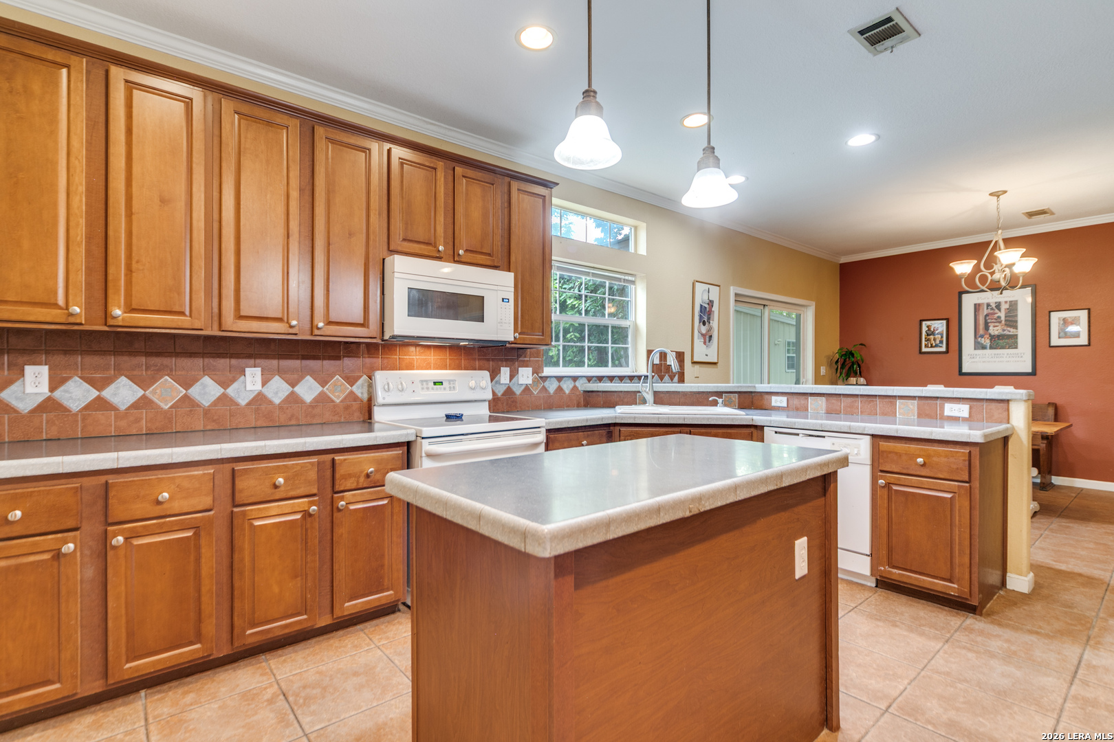 5 Fm 473 Comfort, TX 78013 - Photo 7 of 27 a kitchen with a sink stove and cabinets