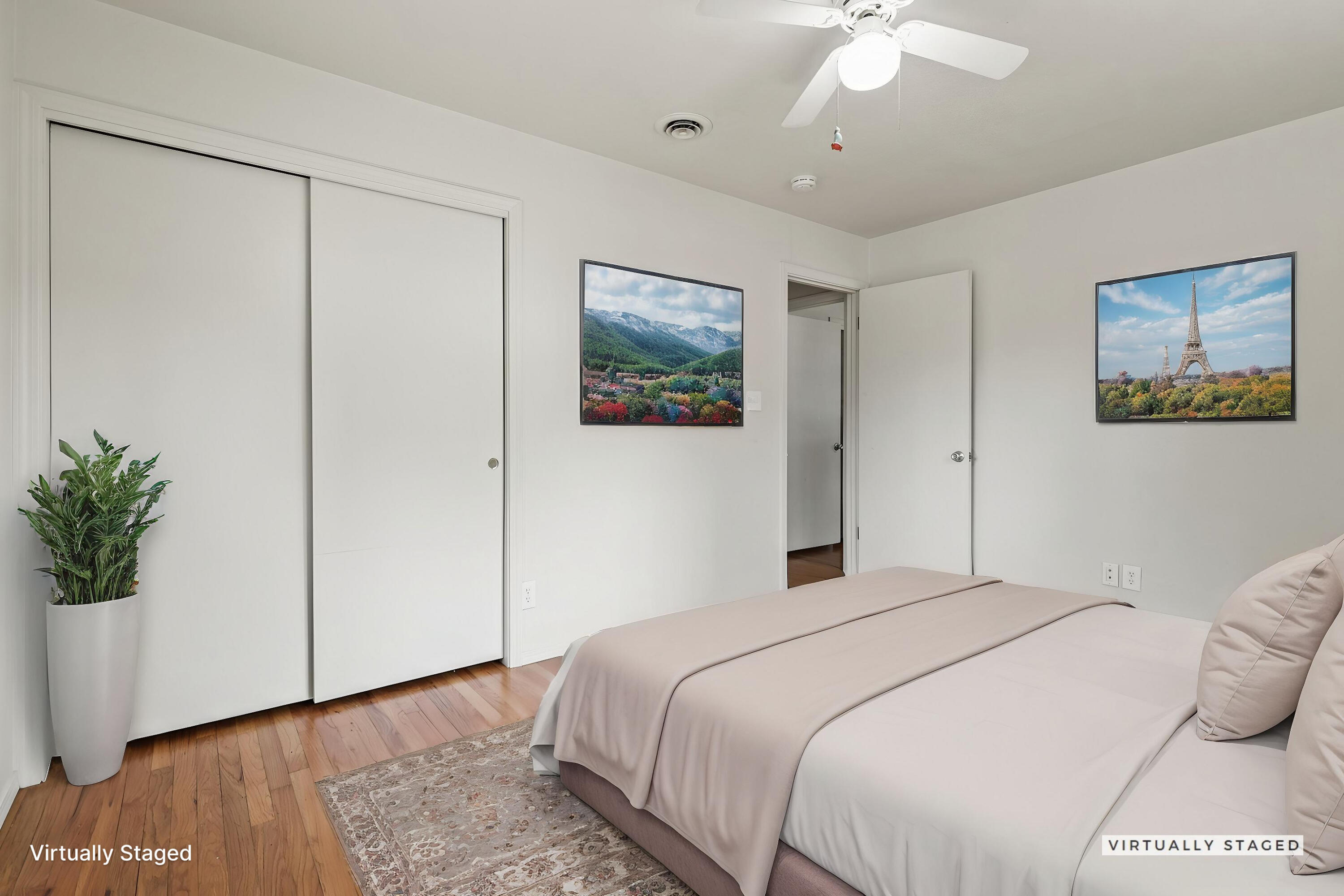 3581 Echo Road Redding, CA 96002 - Photo 12 of 19 a bedroom with a large bed and a chandelier