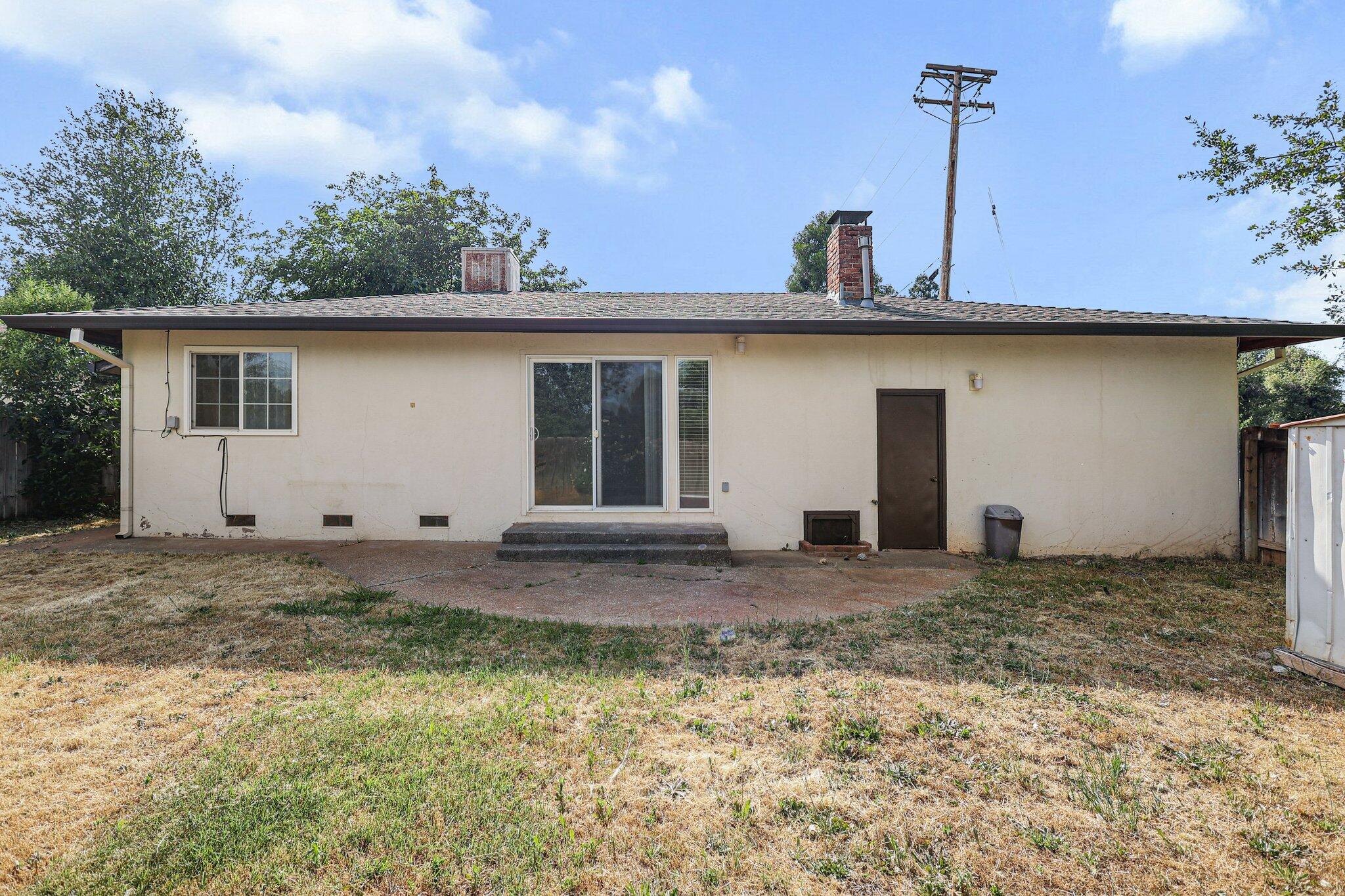 3581 Echo Road Redding, CA 96002 - Photo 16 of 19 a house with trees in the background