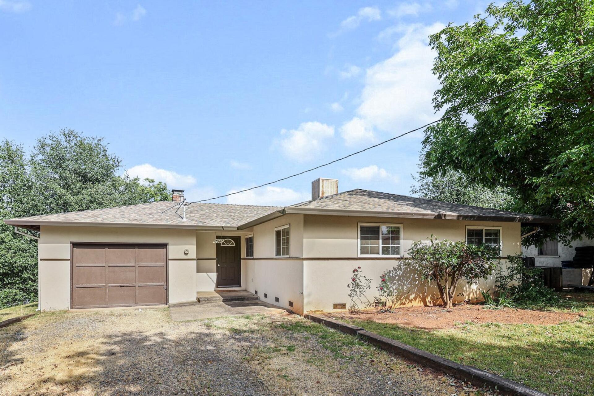 3581 Echo Road Redding, CA 96002 - Photo 19 of 19 a front view of a house with a yard
