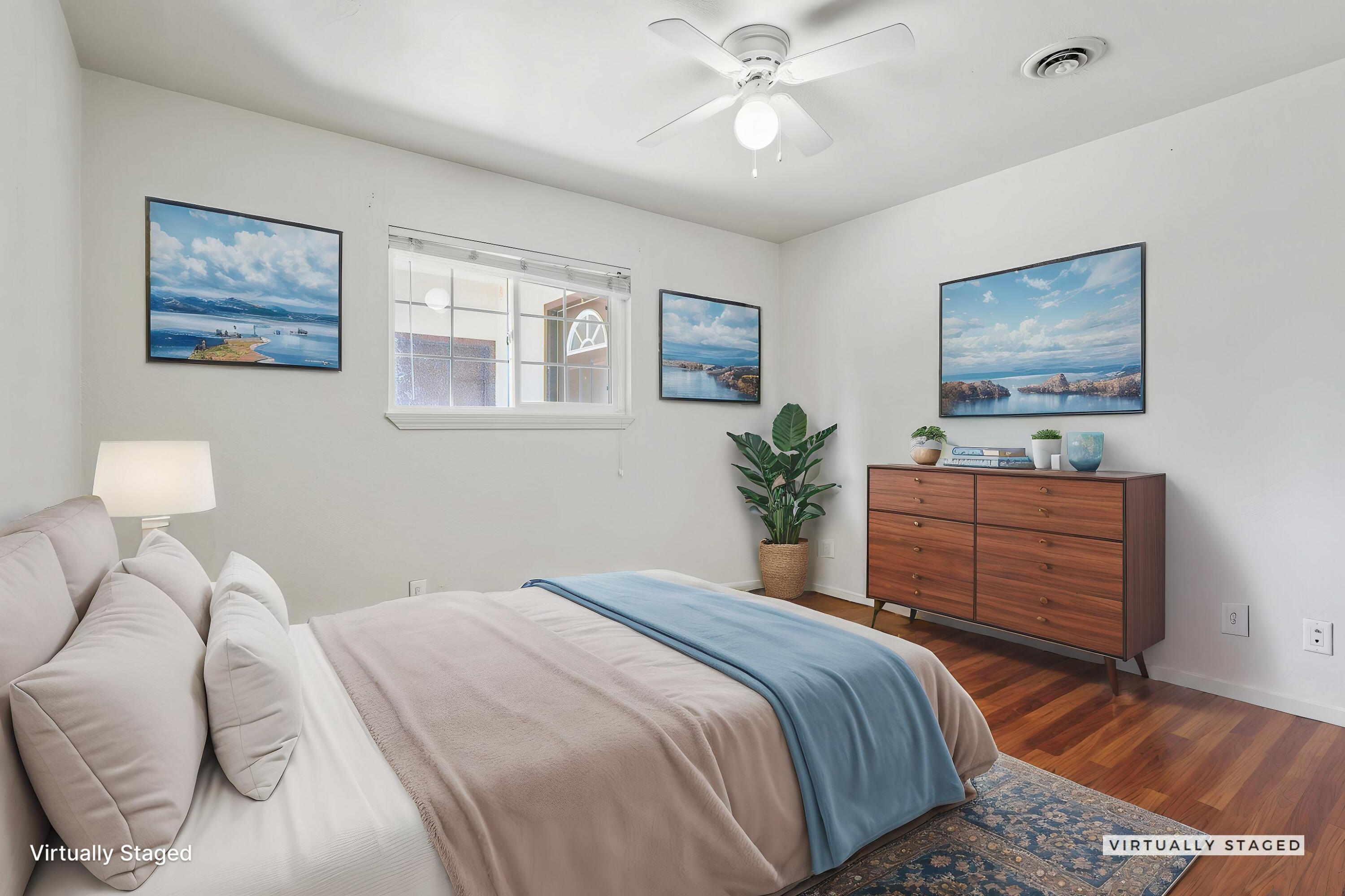 3581 Echo Road Redding, CA 96002 - Photo 10 of 19 a bedroom with a bed and a chandelier