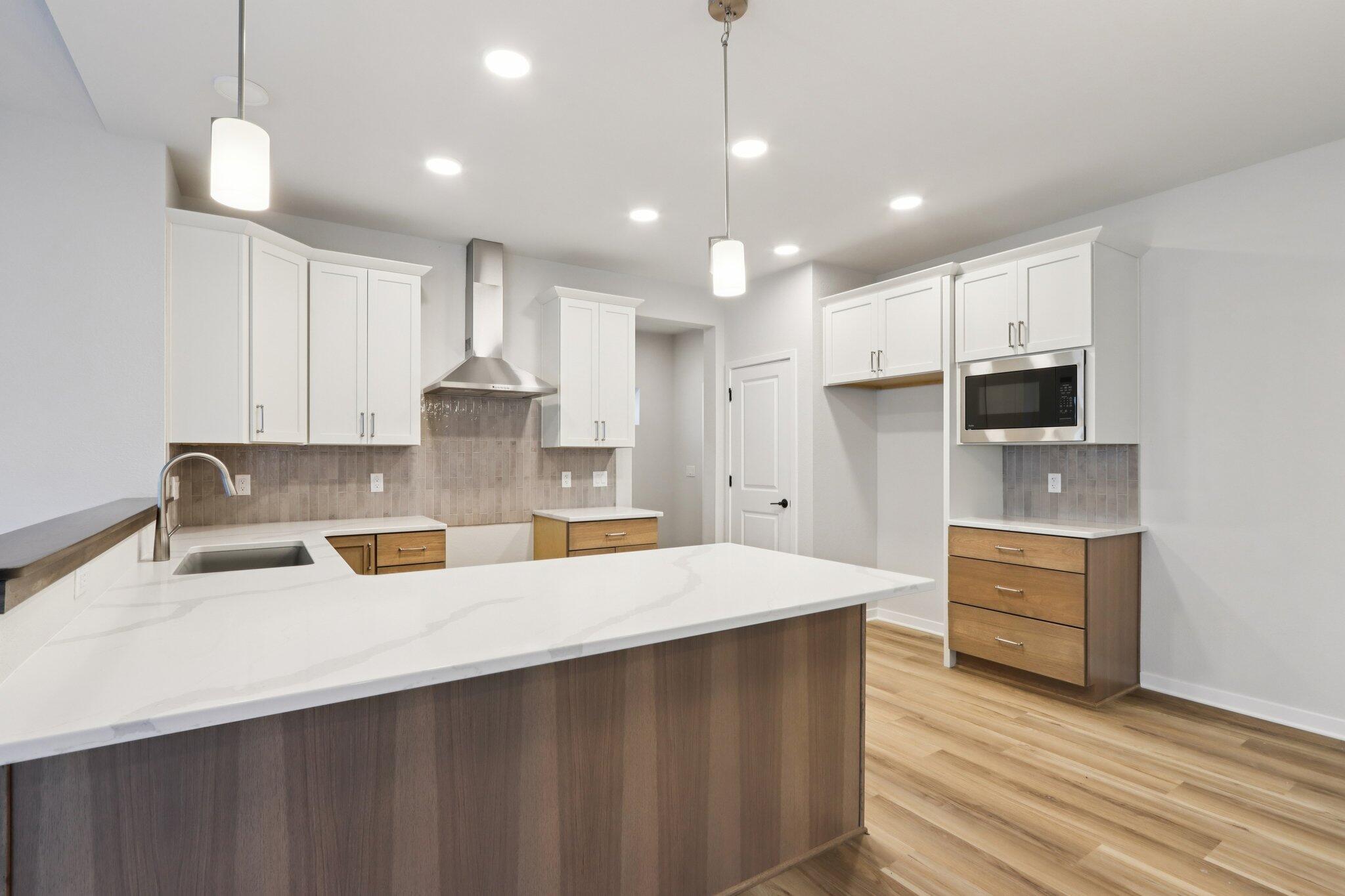 2491 Boulder Drive Slinger, WI 53086 - Photo 14 of 32 Island w/Overhang for Seating