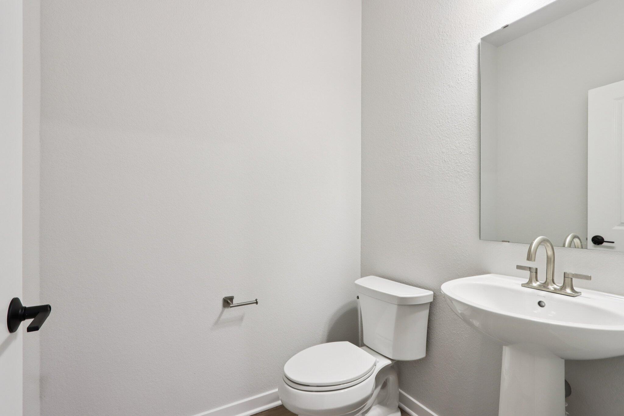 2491 Boulder Drive Slinger, WI 53086 - Photo 17 of 32 1st Floor Powder Bath