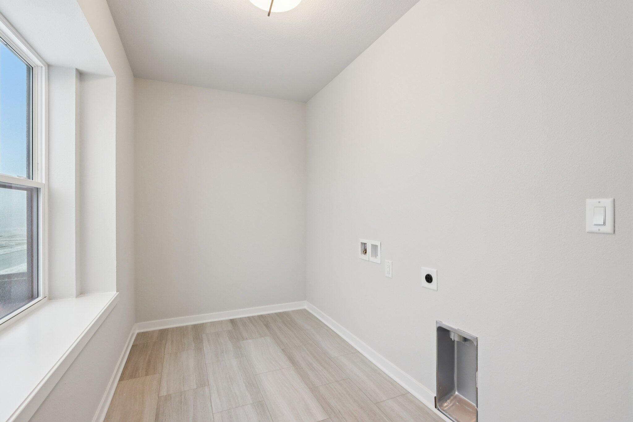 2491 Boulder Drive Slinger, WI 53086 - Photo 19 of 32 2nd Floor Laundry Room