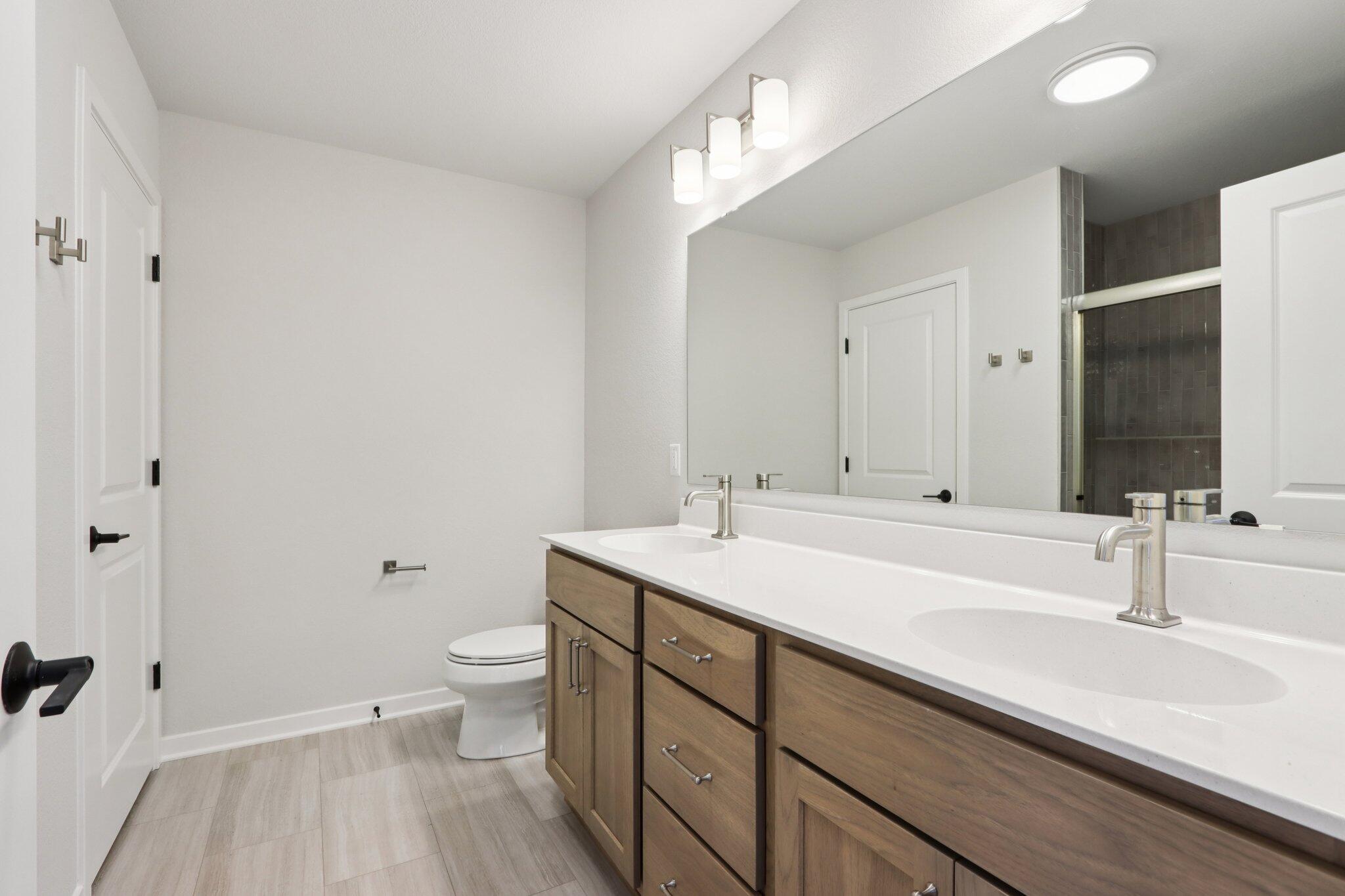 2491 Boulder Drive Slinger, WI 53086 - Photo 24 of 32 Primary Bath w/ 2 Sinks