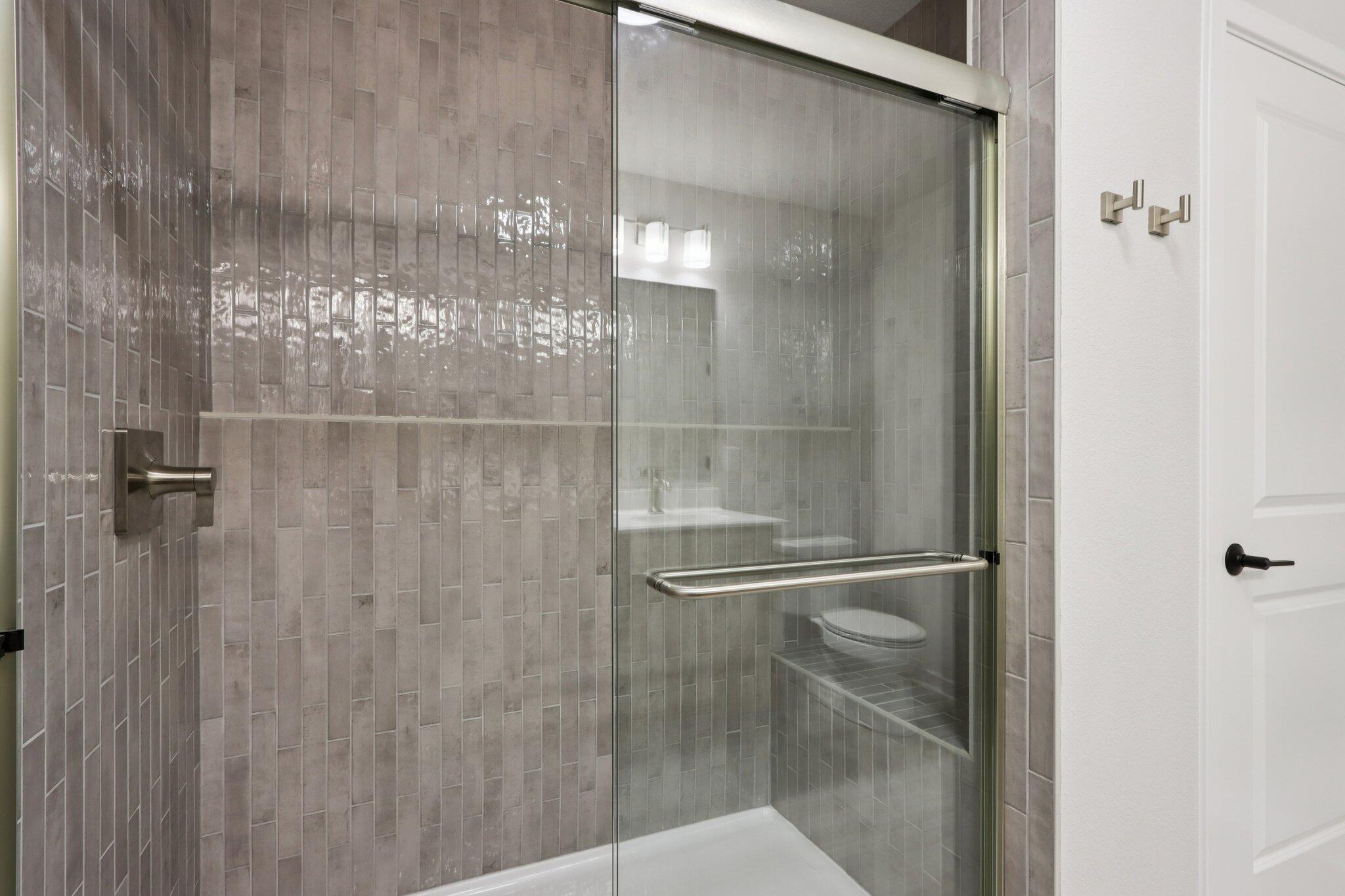 2491 Boulder Drive Slinger, WI 53086 - Photo 25 of 32 Tiled Primary Shower