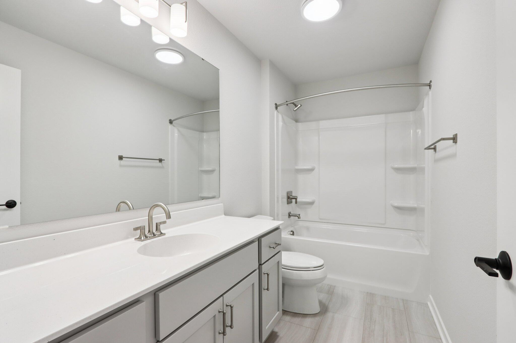 2491 Boulder Drive Slinger, WI 53086 - Photo 27 of 32 Hall Bathroom