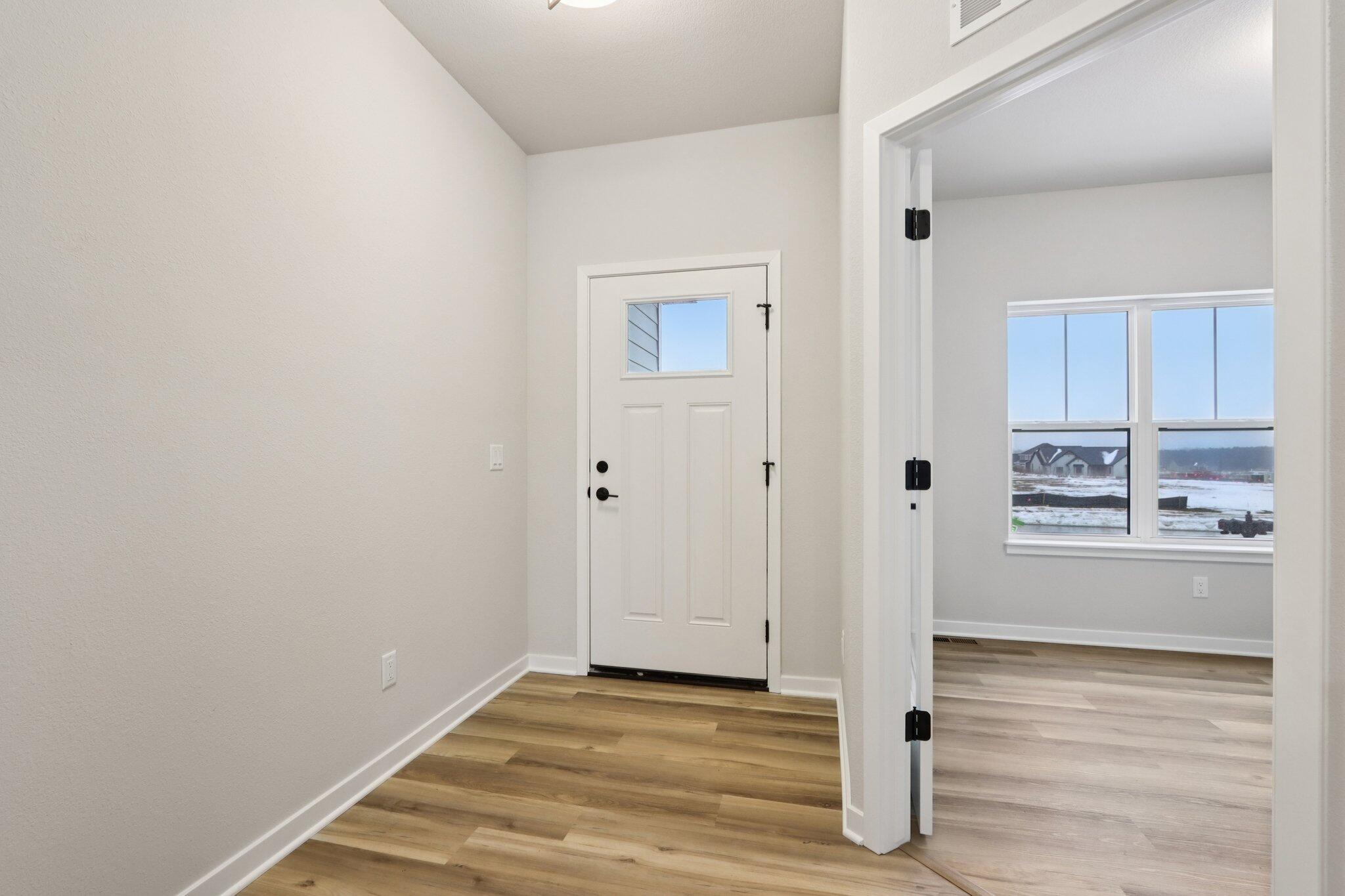 2491 Boulder Drive Slinger, WI 53086 - Photo 3 of 32 Front Foyer