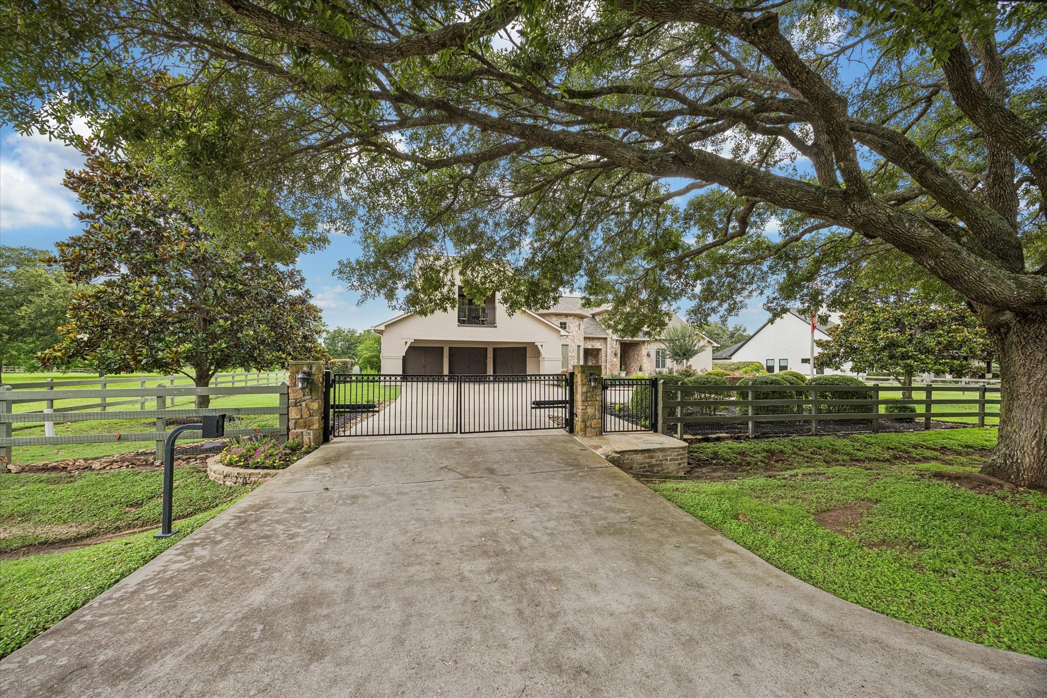 32102 Fulbrook Commons Fulshear, TX 77441 - Photo 16 of 50 A gated entry welcomes you home, providing an added layer of privacy and peace of mind.