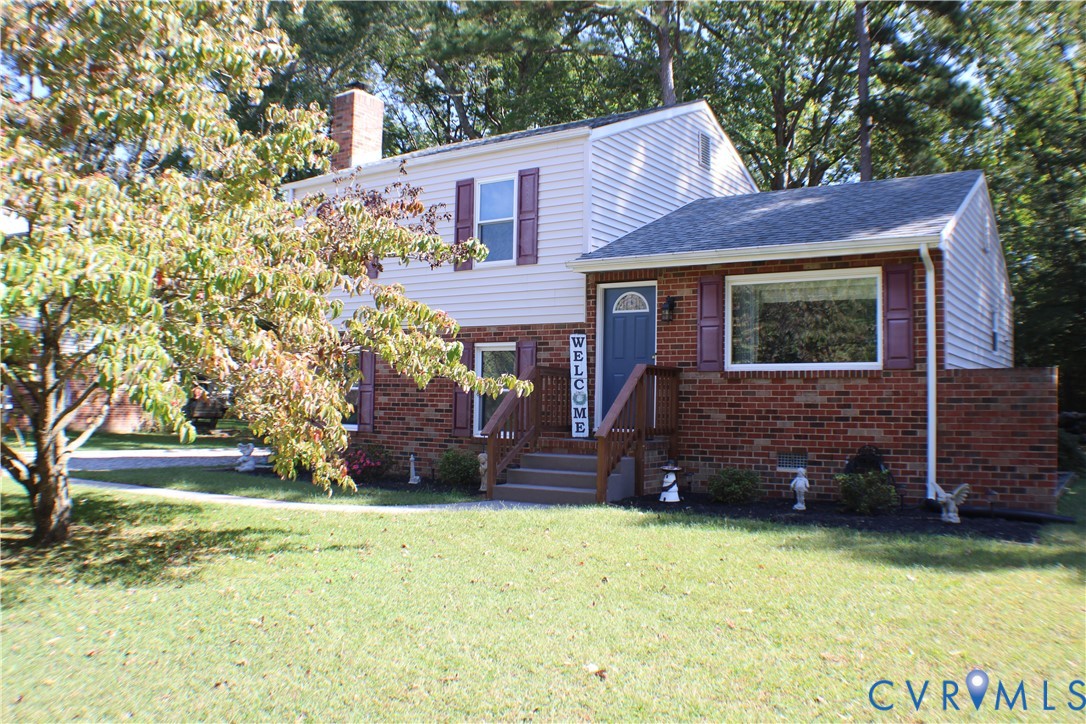 front view of a house with a yard
