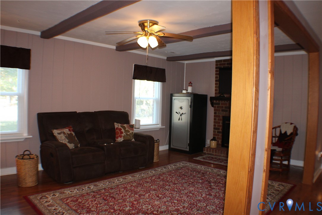 10009 Simplicity Street Chesterfield, VA 23832 - Photo 12 of 47 a living room with furniture rug and a window