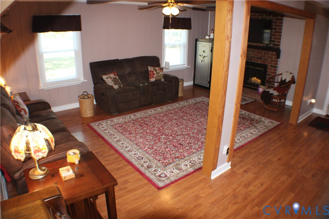 10009 Simplicity Street Chesterfield, VA 23832 - Photo 14 of 47 a living room with couch rug and a window