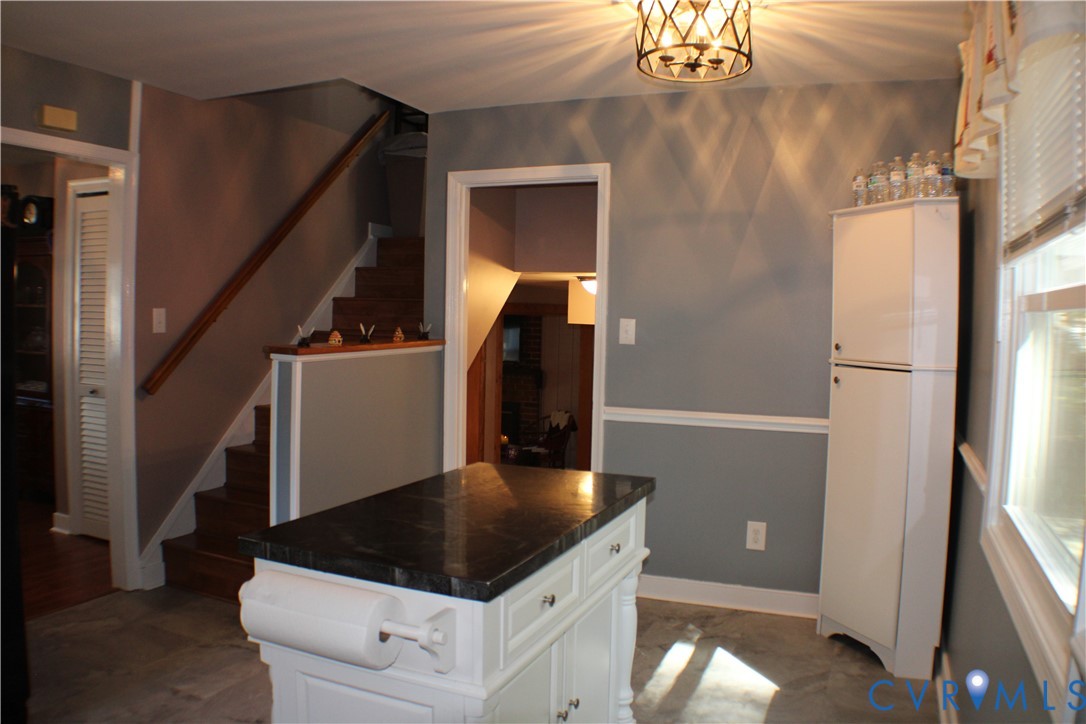 10009 Simplicity Street Chesterfield, VA 23832 - Photo 21 of 47 a kitchen with a refrigerator and cabinets