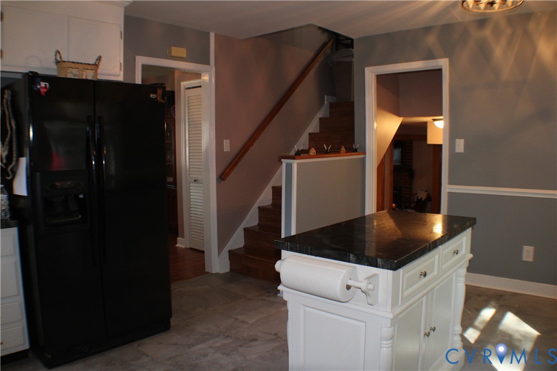 10009 Simplicity Street Chesterfield, VA 23832 - Photo 23 of 47 a kitchen with a refrigerator and a stove