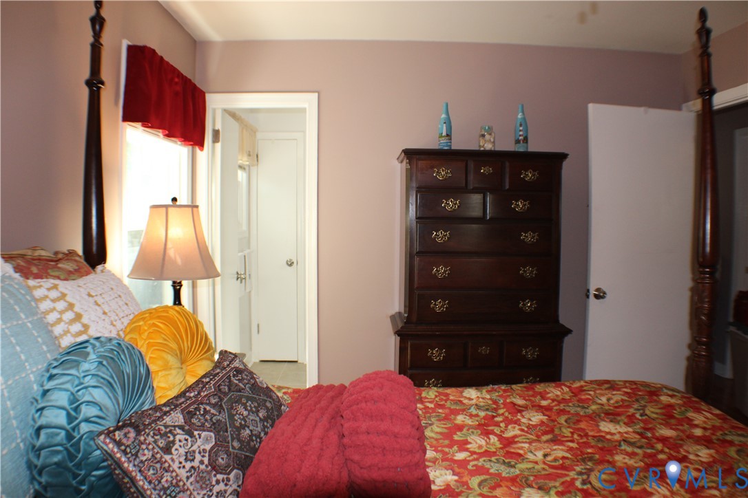 10009 Simplicity Street Chesterfield, VA 23832 - Photo 27 of 47 a bedroom with a bed and a closet