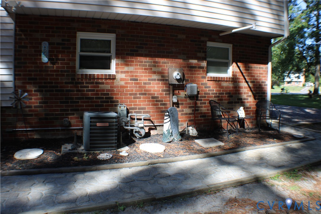 10009 Simplicity Street Chesterfield, VA 23832 - Photo 40 of 47 a view of a garage with an outdoor space