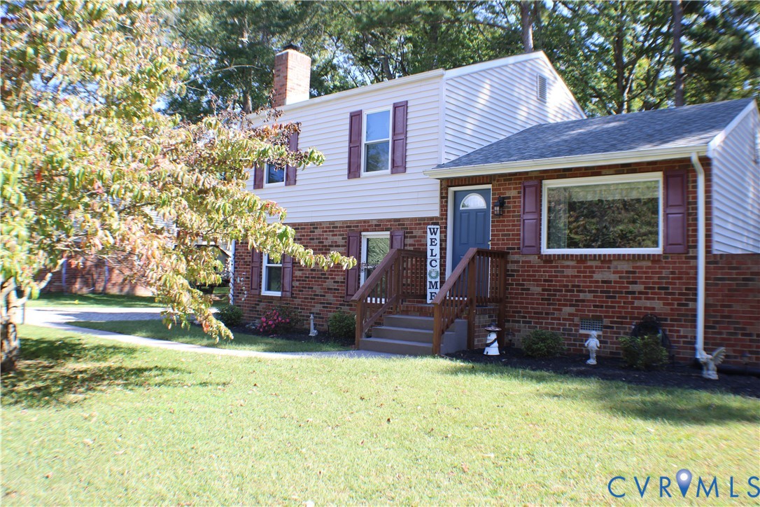 10009 Simplicity Street Chesterfield, VA 23832 - Photo 44 of 47 a view of a house with a yard