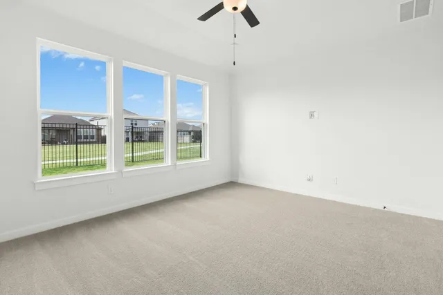 an empty room with windows