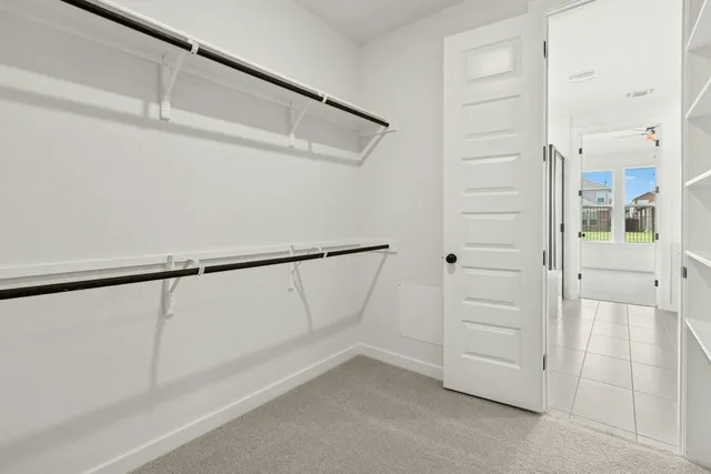 a view of an empty walk in closet