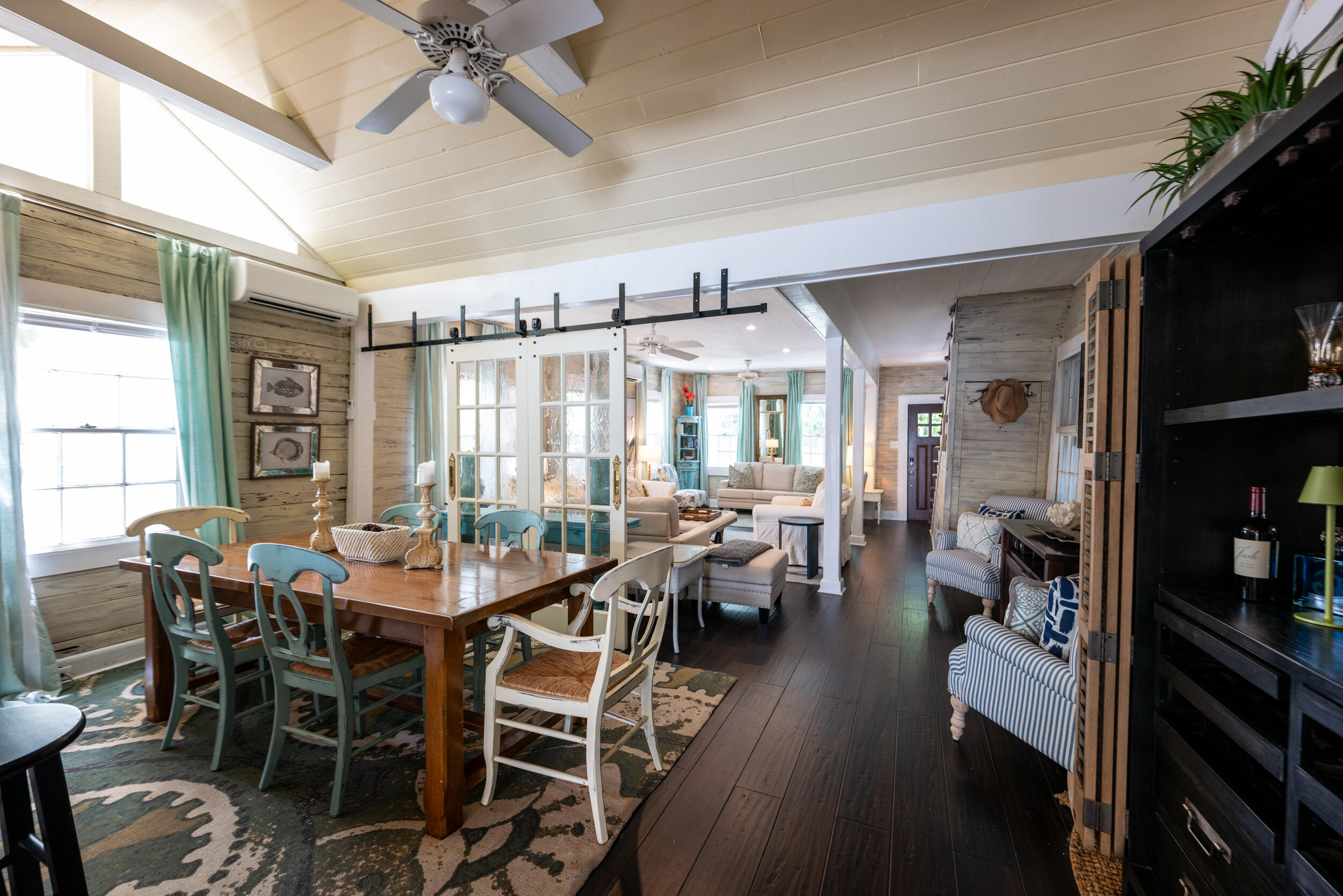 1109 Stump Lane Key West, FL 33040 - Photo 20 of 38 a view of a dining room with furniture window and wooden floor