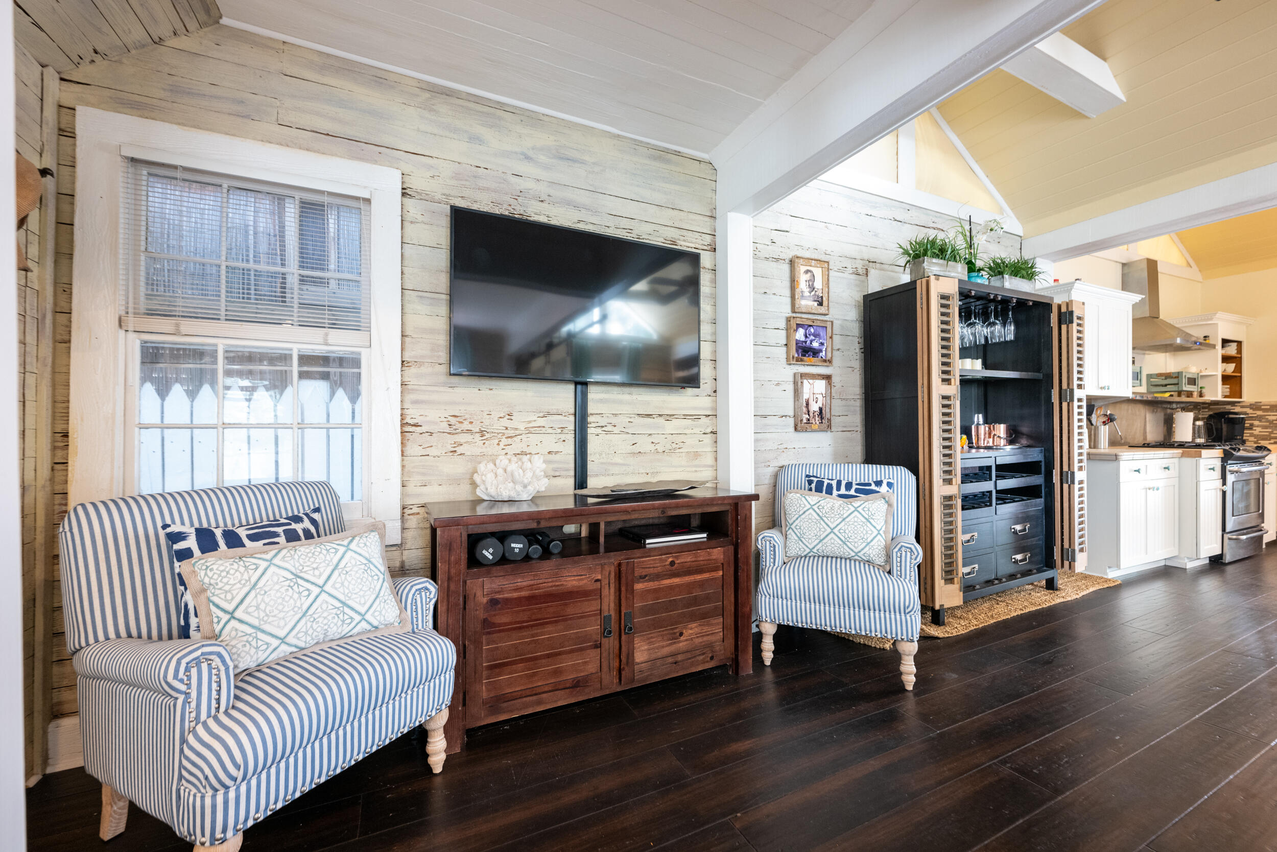 1109 Stump Lane Key West, FL 33040 - Photo 24 of 38 a living room with furniture and a flat screen tv