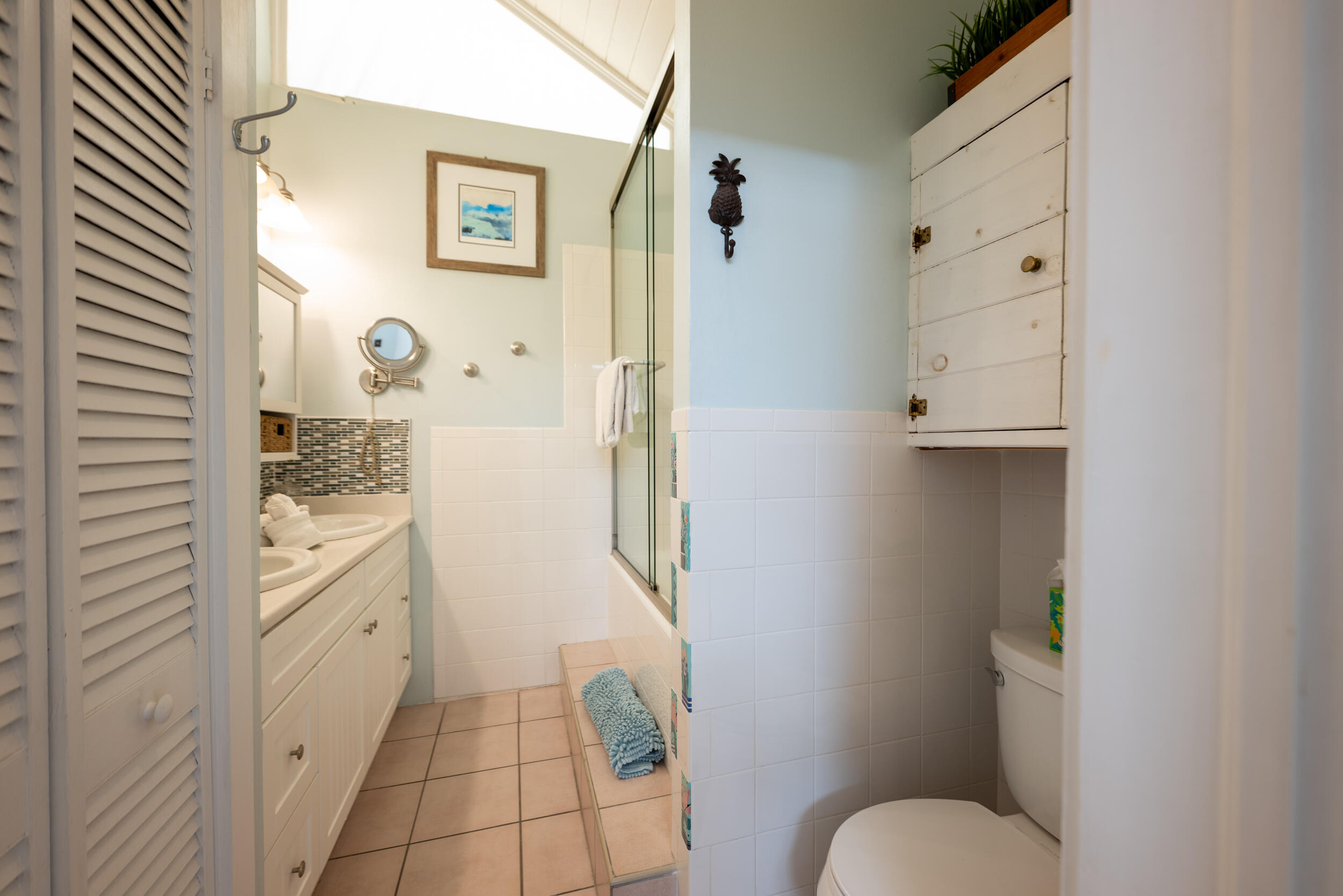 1109 Stump Lane Key West, FL 33040 - Photo 27 of 38 a bathroom with a granite countertop sink toilet and shower
