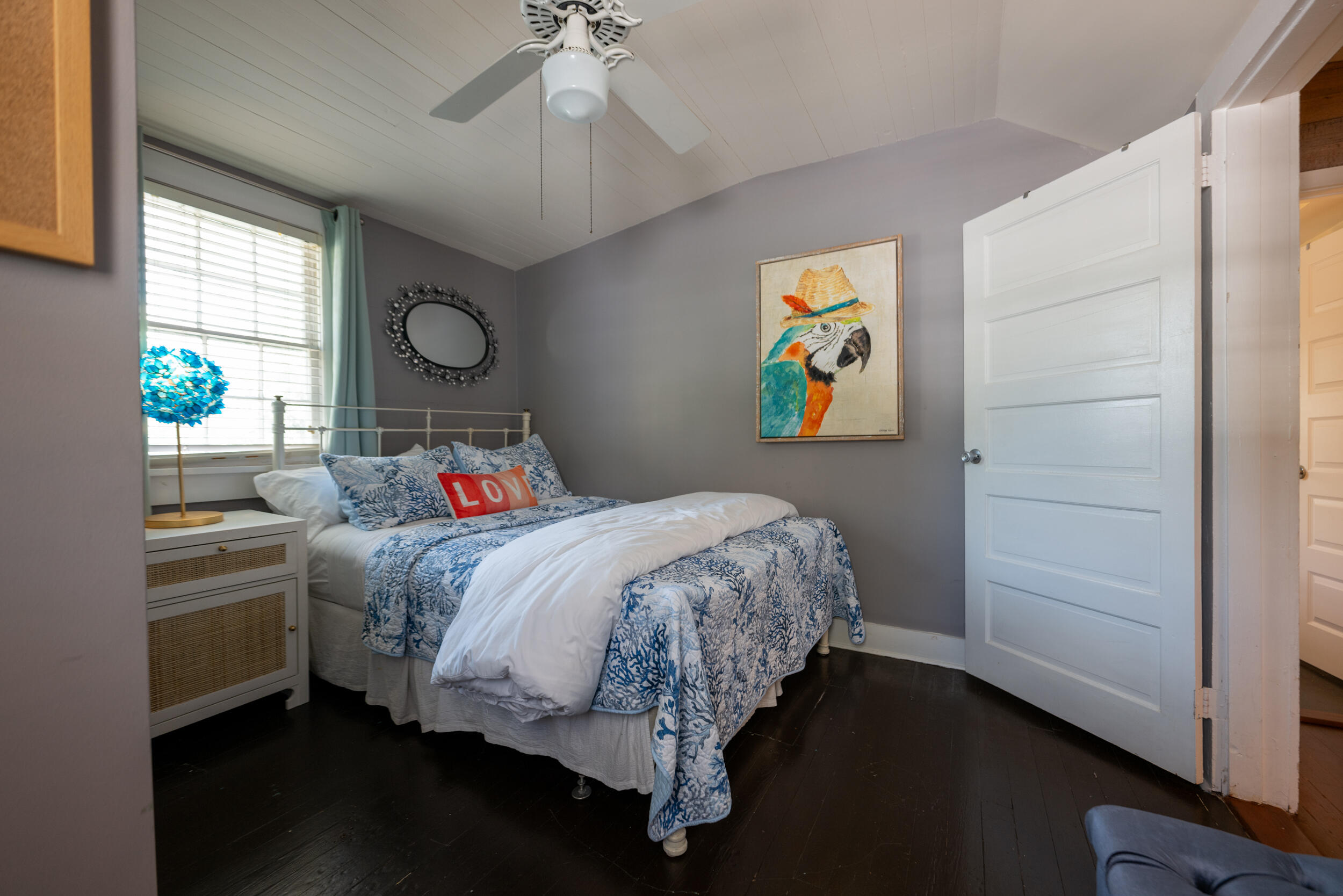 1109 Stump Lane Key West, FL 33040 - Photo 28 of 38 a bedroom with a bed and a window