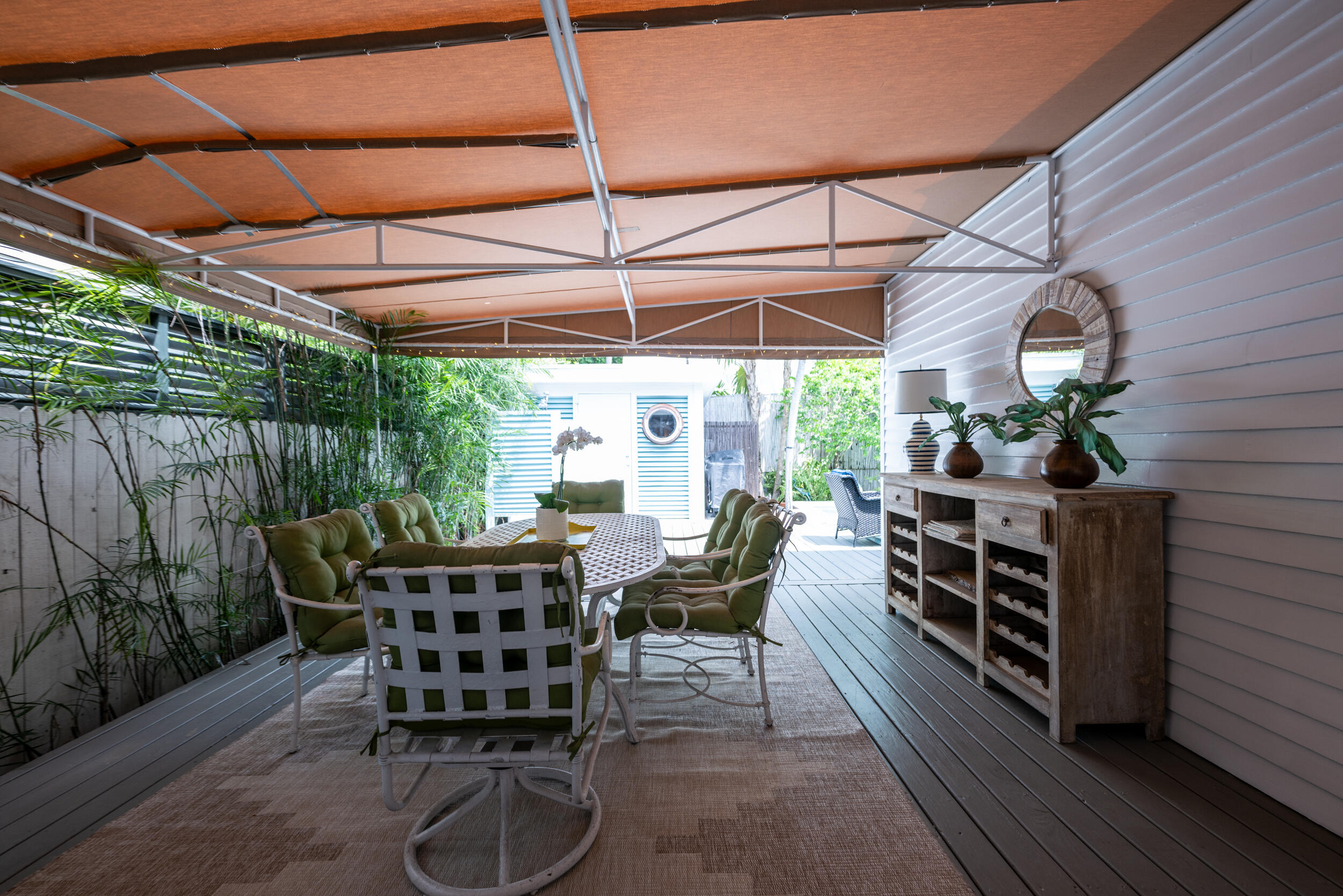 1109 Stump Lane Key West, FL 33040 - Photo 3 of 38 a table and chairs in the patio